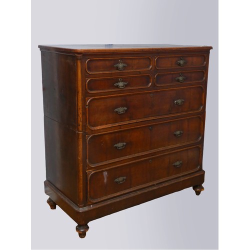 260 - A Georgian mahogany campaign chest of drawers, in two sections, the top with four short drawers over... 