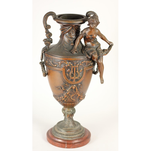 170 - A pair of spelter vases, mounted on red marble, two handles, decorative figures and floral designs, ... 