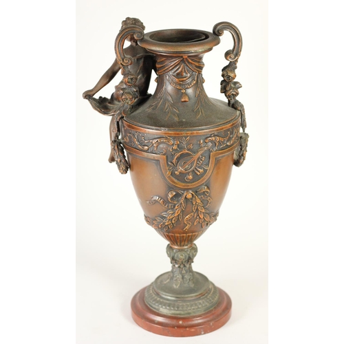 170 - A pair of spelter vases, mounted on red marble, two handles, decorative figures and floral designs, ... 