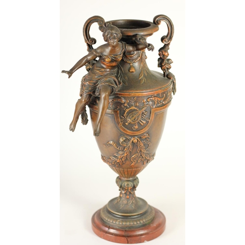 170 - A pair of spelter vases, mounted on red marble, two handles, decorative figures and floral designs, ... 