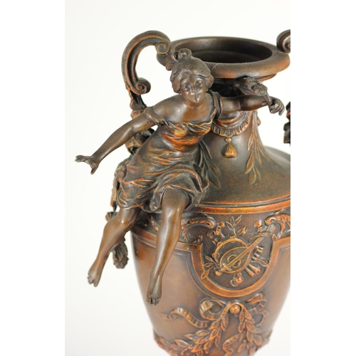 170 - A pair of spelter vases, mounted on red marble, two handles, decorative figures and floral designs, ... 