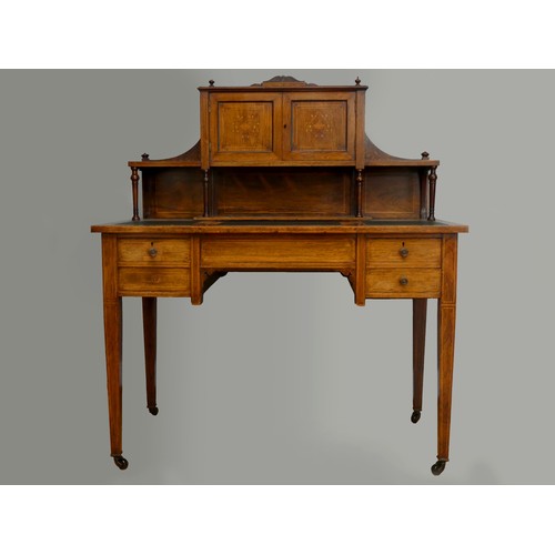 253 - A Victorian rosewood and boxwood inlaid writing desk, with inlaid reticulated gallery panels, the up... 