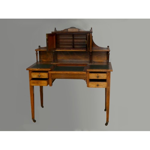 253 - A Victorian rosewood and boxwood inlaid writing desk, with inlaid reticulated gallery panels, the up... 