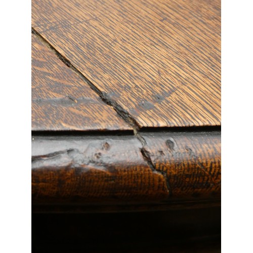 247 - A late 19th century oak wind out dining table with three leaves, together with a set of eight matchi... 