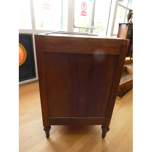 258 - A French walnut chest of three drawers, flanked by fluted columns, raised on tapering feet, grey mar... 