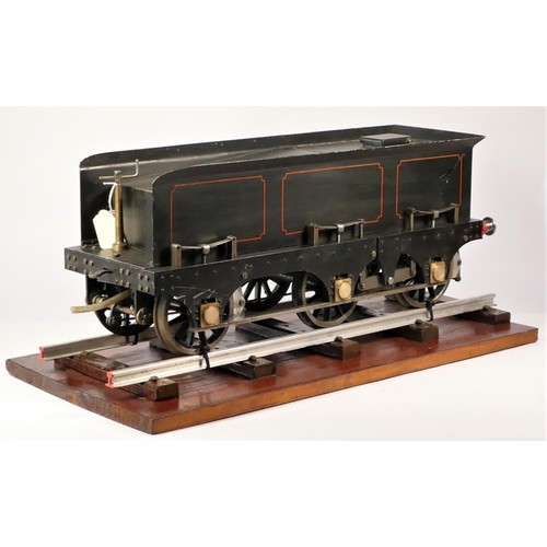 13 - A tender from a 5" gauge live stream locomotive, presented on a length of track, secured to a basebo...