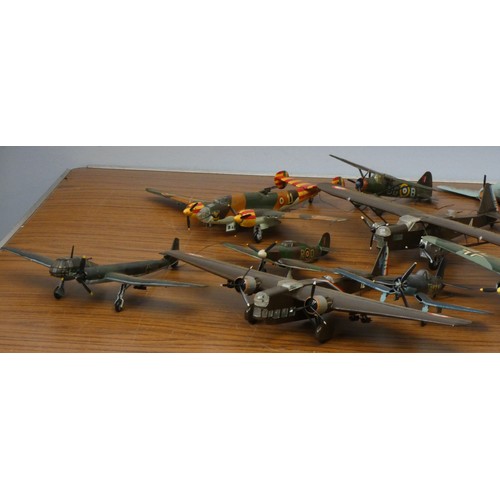 103 - A collection of model aircraft, pre and post war aircraft from the German, Japanese and Allied force... 