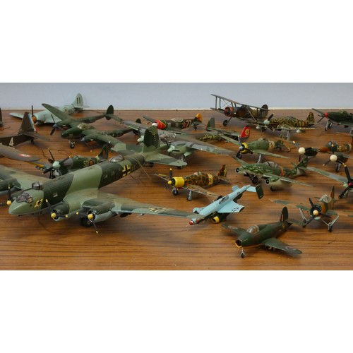 103 - A collection of model aircraft, pre and post war aircraft from the German, Japanese and Allied force... 