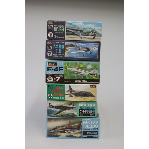 119 - Six Fujimi aircraft 1/72 model kits, to include : 

MiG29 Fulclum German MiG
Spitfire F.R.Mk14E 