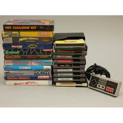 21 - A collection of Nintendo Entertainment System cartridge games to include, Super Mario Bros, Super Ma...