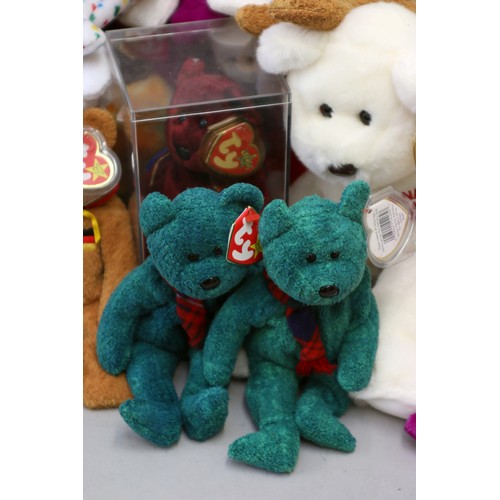 67 - A collection of 50 Beanie babies, including Millennium, a cased Buckingham, Maple, Ty the Giraffe al... 