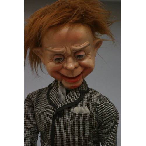 72 - A ventriloquist's doll, with moveable mouth and eyes, made from a plastic composite