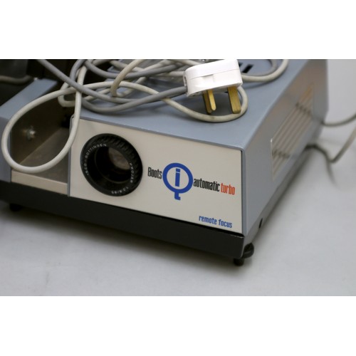 183 - Three 35mm slide projectors, including a Rank Aldis tutor 500, with box and accessories, also includ... 