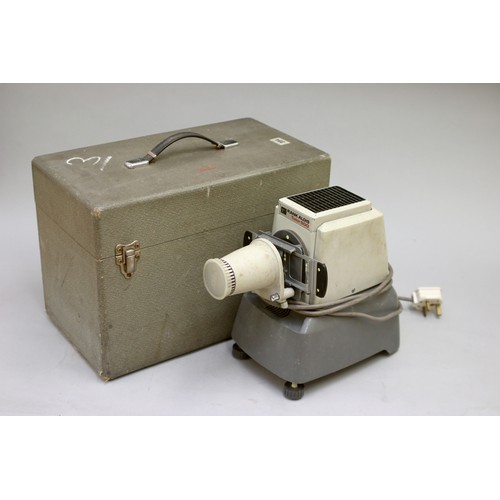 183 - Three 35mm slide projectors, including a Rank Aldis tutor 500, with box and accessories, also includ... 