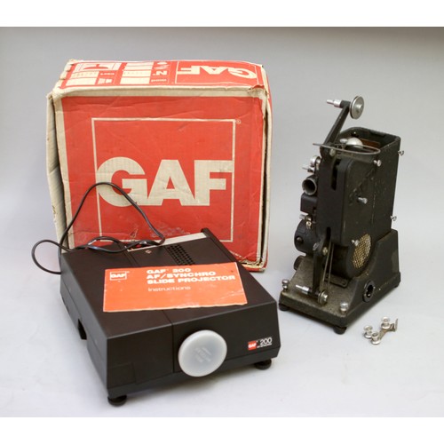 184 - A GAF 200 AF/Synchro Slide projector, with box and manuel, together with a Specto Ltd Type C movie p... 