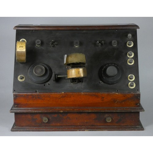 189 - A 1920's home made radio with black enonite front panel with two 4 pin valve sockets, with removeabl... 