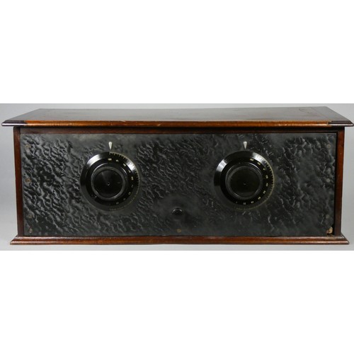 191 - A wood cased radio from 1920's - has two BBC marked valves. Two adjustment knobs, patterned ebonite ... 