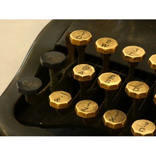 187 - A typewriter made by The Oliver typewriter company, model #9, also knows as a 