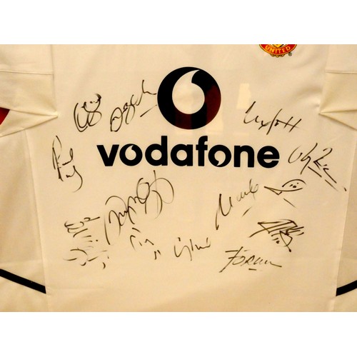 85 - A Manchester United signed replica shirt, the shirt is the away kit from the 2002-2003 season in whi... 