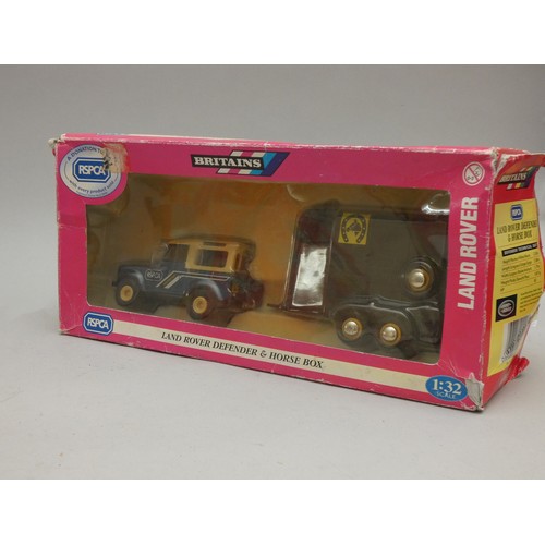 216 - Britains boxed models to include - Land Rover Defender & Horse Box, No.40099, Samson Manure Spreader... 