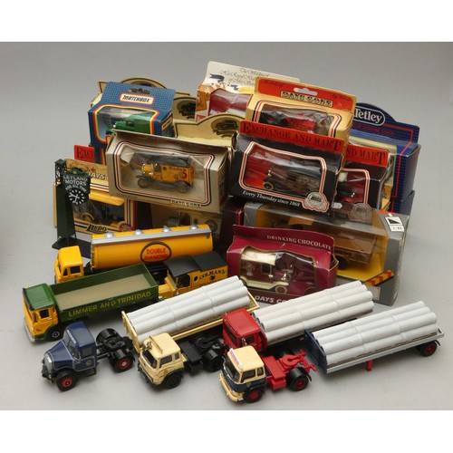 219 - A collection of six Corgi die-cast trucks, together with a collection of boxed die-cast models to in... 