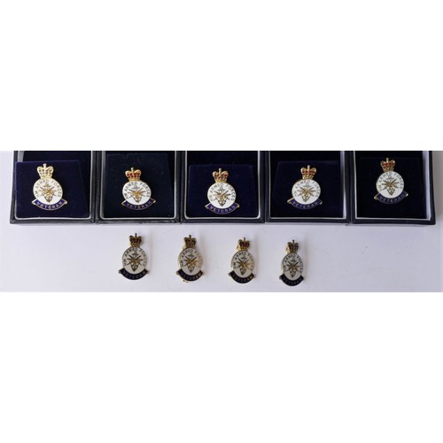 278 - Nine HM Armed Forces Veteran gilt metal and enamel lapel badges, 5 boxed.