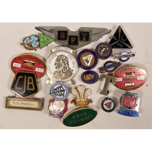 288 - A collection of lapel pins and badges, to include London Trams.