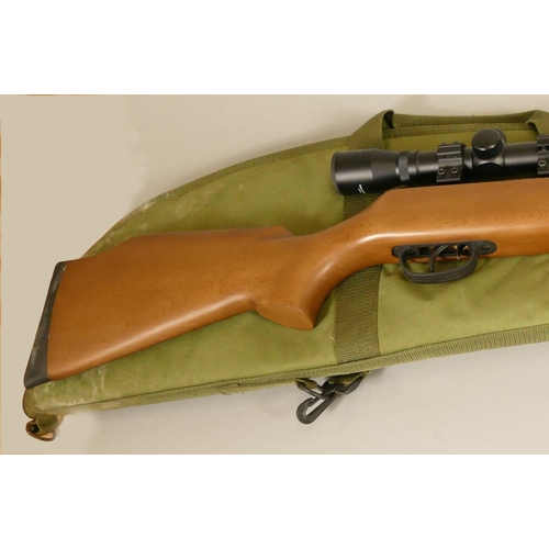 291 - A Crosman Optimus break barrel air rifle, with Centre Point 4 x 32 sight, soft case