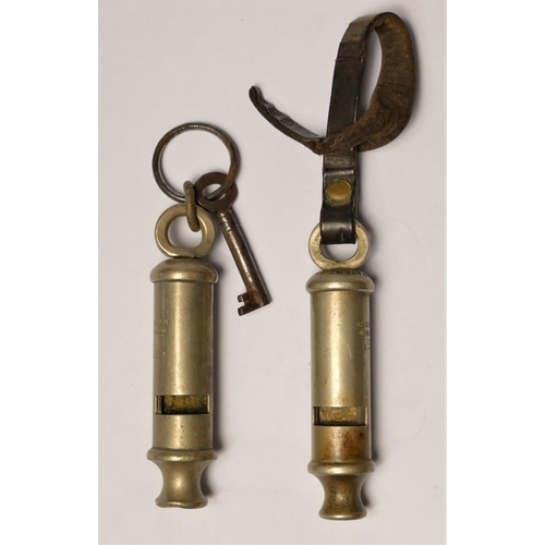 297 - Two Hudson whistles, both dated 1915