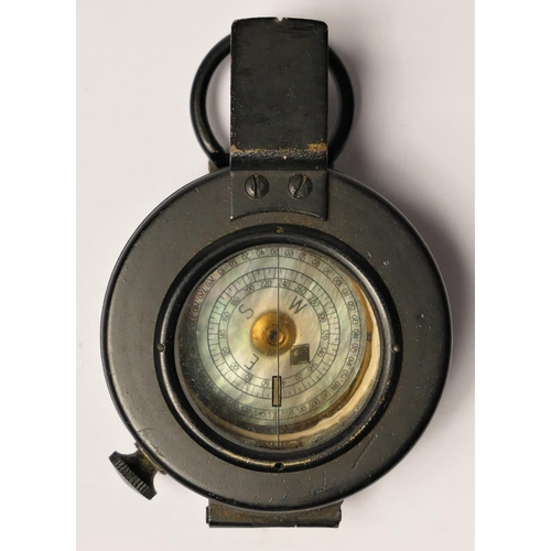 298 - A WWII Mk III British Compass, by T.G. Co. Ltd. number B31235, broad arrow, dated 1940, box