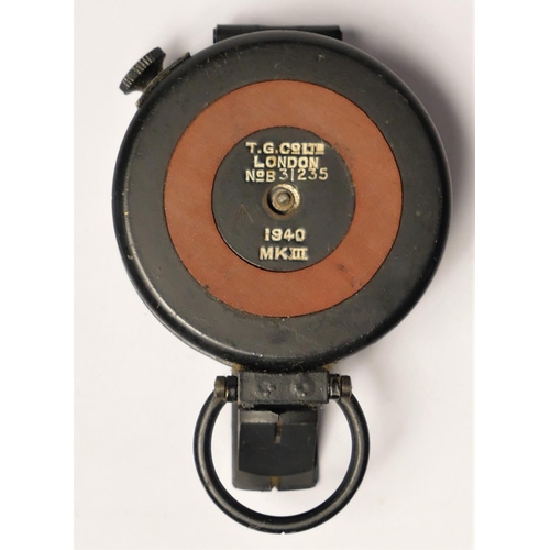 298 - A WWII Mk III British Compass, by T.G. Co. Ltd. number B31235, broad arrow, dated 1940, box