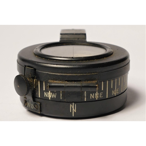 298 - A WWII Mk III British Compass, by T.G. Co. Ltd. number B31235, broad arrow, dated 1940, box