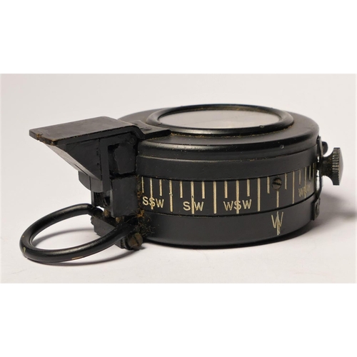 298 - A WWII Mk III British Compass, by T.G. Co. Ltd. number B31235, broad arrow, dated 1940, box