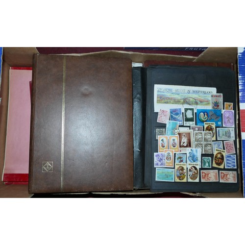 306 - A large collection of stamps, to include albums and stockbooks, and hundreds of loose (7)