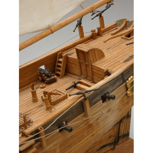 368 - An armed cutter, static display model, plank on frame construction, with Seahorse figurehead, 77 x 6... 