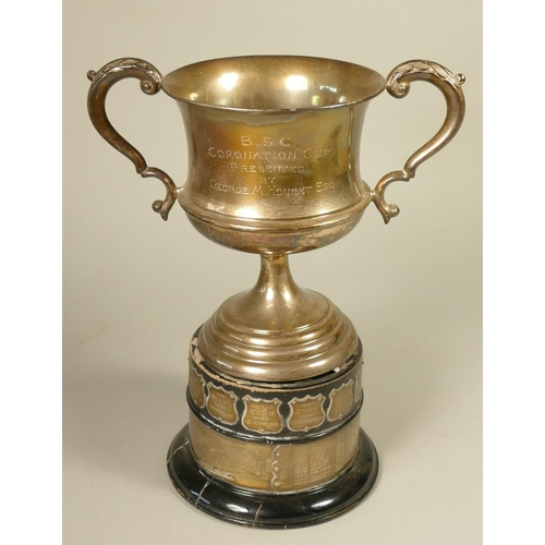 381 - A silver sailing presentation trophy, Sheffield 1948, D.S.C., Coronation Cup, 21cm, 538gm, plinth 
E... 