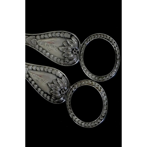 386 - A Victorian presentation silver pair of grape scissors, by George Adams, London 1863, with heart mot... 