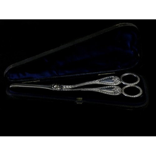 386 - A Victorian presentation silver pair of grape scissors, by George Adams, London 1863, with heart mot... 