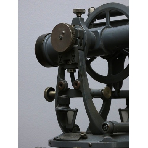 391 - An engineers/surveyors transit theodolite, painted grey, 30 x 20cm.