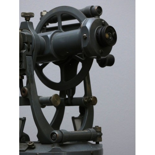 391 - An engineers/surveyors transit theodolite, painted grey, 30 x 20cm.