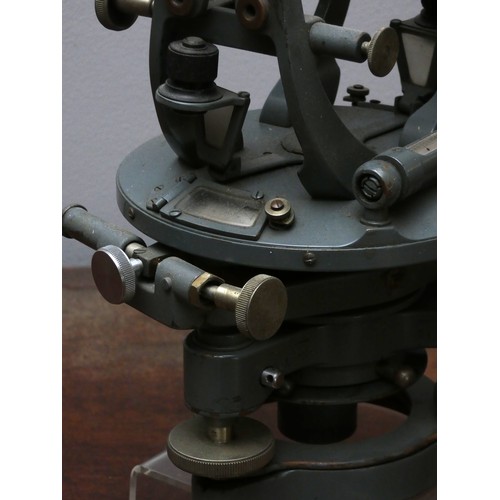 391 - An engineers/surveyors transit theodolite, painted grey, 30 x 20cm.