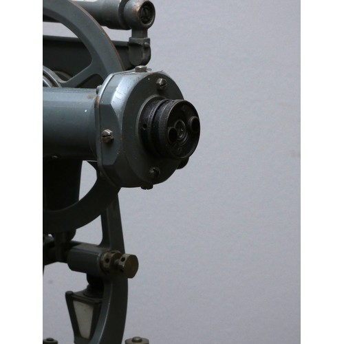 391 - An engineers/surveyors transit theodolite, painted grey, 30 x 20cm.