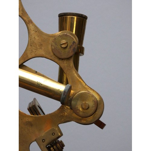 392 - A reproduction brass sextant, 19cm, hardwood case