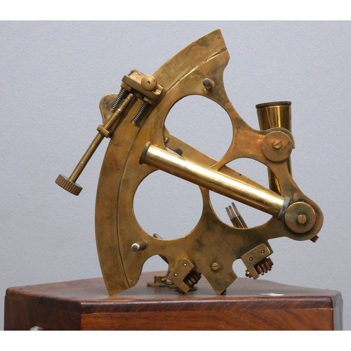 392 - A reproduction brass sextant, 19cm, hardwood case