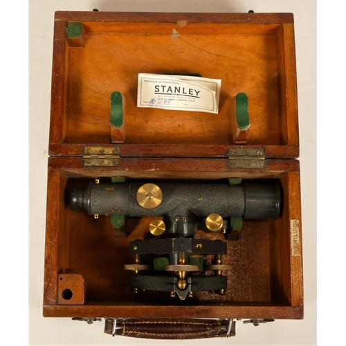 396 - A Stanley black theodolite, serial number 46430, serviced by Stanley in 1969, case.