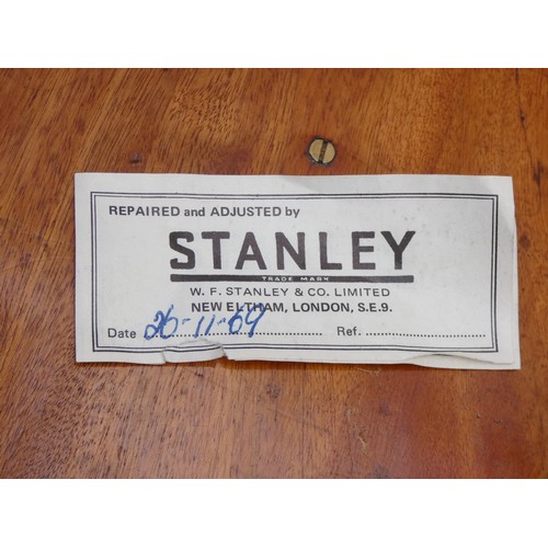 396 - A Stanley black theodolite, serial number 46430, serviced by Stanley in 1969, case.