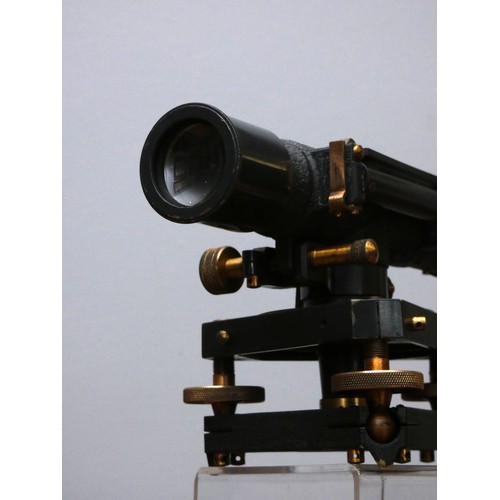 396 - A Stanley black theodolite, serial number 46430, serviced by Stanley in 1969, case.