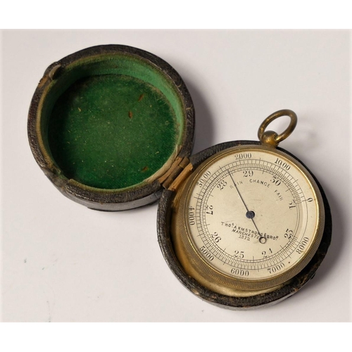 405 - A brass pocket barometer, by Thos. Armstrong, Manchester, numbered 1372, 45mm, case