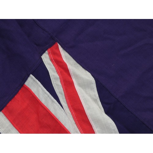 411 - A vintage Red Ensign, 100 x 200cm, a Blue Ensign, 85 x 180cm, a Union Flag, 125 x 265 and three mode... 