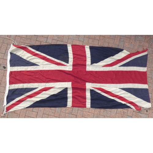 411 - A vintage Red Ensign, 100 x 200cm, a Blue Ensign, 85 x 180cm, a Union Flag, 125 x 265 and three mode... 